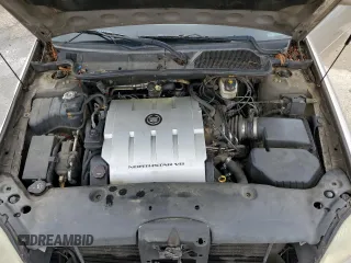 2004 Cadillac DeVille z VIN 1G6KD54Y64U134605, wystawiony jako Copart lot #56258215 z przebiegiem 256 662 mil mil oraz Szkody całkowita. Historia ofert i sprzedaży dostępna na DreamBid. Obrazek 12.