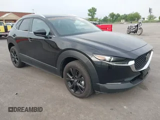 2025 Mazda CX-30 S Select Sport z VIN 3MVDMBBM0SM760087, wystawiony jako IAAI lot #42291814 z przebiegiem 1 483 mil mil oraz . Historia ofert i sprzedaży dostępna na DreamBid. Obrazek 1.