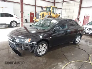 2008 Mitsubishi Lancer DE with VIN JA3AU26UX8U015865, listed as a IAAI auction lot 41108329 with 131,884 mi miles. Bid and sale history available at carsss.com. Image 2.