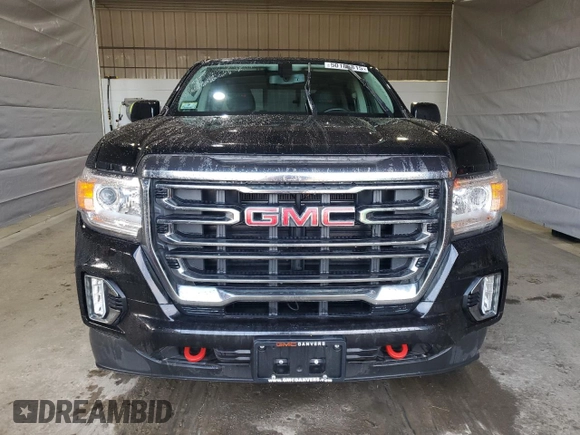 2021 GMC Canyon 4WD AT4 w/Leather with VIN 1GTG6FEN8M1255144, listed as a Copart auction lot 50186815 with 43,610 mi miles and Salvage Title. Bid and sale history available at carsss.com. Image 5.