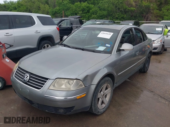2004 Volkswagen Passat GLX z VIN WVWRH63B44P197011, wystawiony jako IAAI lot #42019610 z przebiegiem 151 540 mil mil oraz . Historia ofert i sprzedaży dostępna na DreamBid. Obrazek 2.