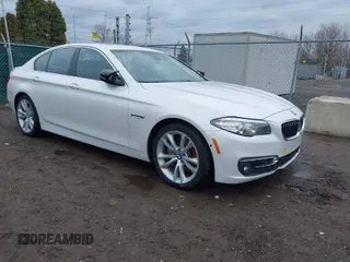 2014 BMW 5 Series 535i xDrive with VIN WBA5B3C50ED292545, listed as a IAAI auction lot 41841578 with 99,072 mi miles and . Bid and sale history available at carsss.com. Image 1.