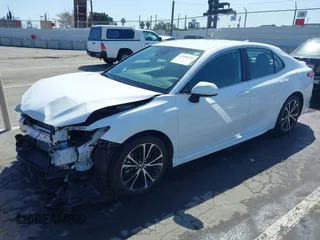 2020 Toyota Camry SE z VIN 4T1G11AK2LU970118, wystawiony jako IAAI lot #41950188 z przebiegiem 11 171 mil mil oraz . Historia ofert i sprzedaży dostępna na DreamBid. Obrazek 18.