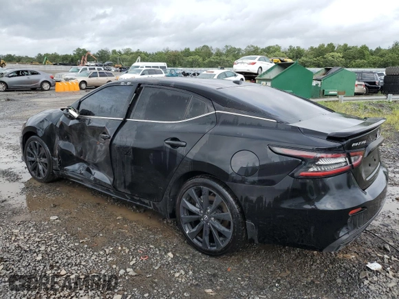 2023 Nissan Maxima SR with VIN 1N4AA6EV8PC506487, listed as a Copart auction lot 66585654 with 770 mi miles and Salvage title. Bid and sale history available at DreamBid. Image 2.