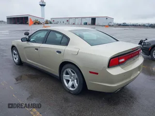 2013 Dodge Charger Police with VIN 2C3CDXAT9DH692946, listed as a IAAI auction lot 42115225 with 107,086 mi miles. Bid and sale history available at carsss.com. Image 3.