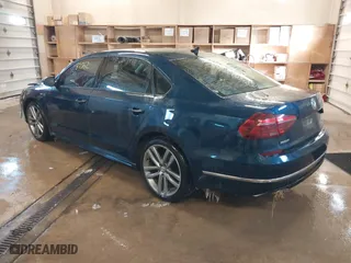 2018 Volkswagen Passat 2.0T S with VIN 1VWAA7A38JC013787, listed as a IAAI auction lot 41587362 with 127,970 mi miles. Bid and sale history available at carsss.com. Image 3.