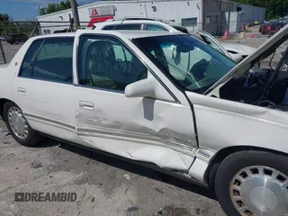 1999 Cadillac DeVille z VIN 1G6KD54Y3XU712969, wystawiony jako IAAI lot #42344041 z przebiegiem 169 572 mil mil oraz . Historia ofert i sprzedaży dostępna na DreamBid. Obrazek 6.