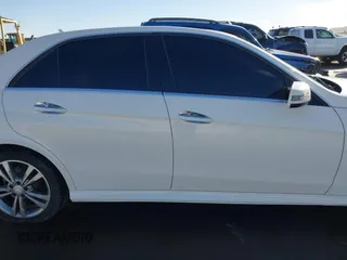 2014 Mercedes-Benz E-Class E 250 BlueTEC Luxury with VIN WDDHF0EB1EA873470, listed as a IAAI auction lot 41406978 with 98,515 mi miles. Bid and sale history available at carsss.com. Image 14.