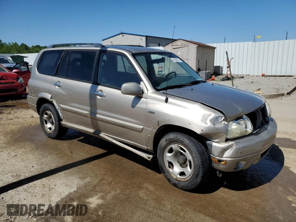 2002 Suzuki XL7 Standard z VIN JS3TY92V524108548, wystawiony jako Copart lot #56304705 z przebiegiem 288 201 mil mil oraz Nie do naprawy • Non repairable. Historia ofert i sprzedaży dostępna na DreamBid. Obrazek 4.
