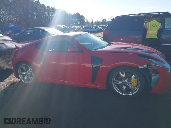 2009 Nissan 370Z Touring with VIN JN1AZ44E19M401881, listed as a IAAI auction lot 41183986 with 127,000 mi miles and . Bid and sale history available at DreamBid. Image 13.