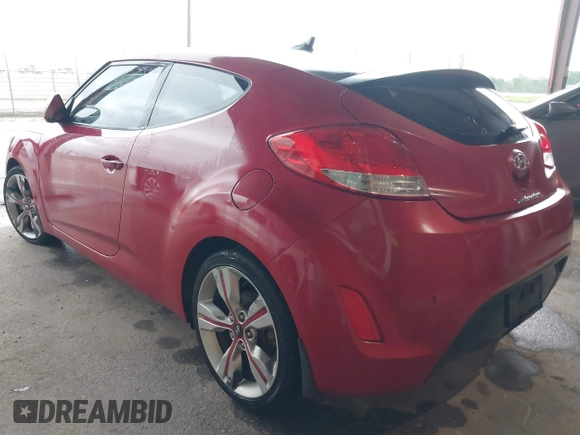 2014 Hyundai Veloster z VIN KMHTC6AD3EU201508, wystawiony jako IAAI lot #42353066 z przebiegiem 140 032 mil mil oraz . Historia ofert i sprzedaży dostępna na DreamBid. Obrazek 3.