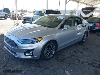 2019 Ford Fusion Hybrid Titanium with VIN 3FA6P0RU1KR217478, listed as a IAAI auction lot 41625872 with 87,059 mi miles. Bid and sale history available at carsss.com. Image 17.
