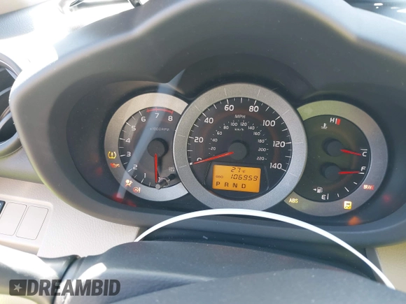 2009 Toyota RAV4 with VIN JTMZF33V995000660, listed as a IAAI auction lot 41633209 with 106,959 mi miles. Bid and sale history available at carsss.com. Image 7.