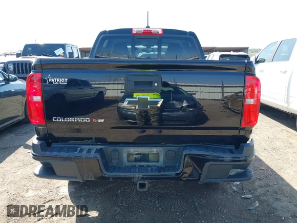 2018 Chevrolet Colorado 4WD Z71 z VIN 1GCGTDEN0J1173420, wystawiony jako IAAI lot #41971813 z przebiegiem 98 499 mil mil oraz . Historia ofert i sprzedaży dostępna na DreamBid. Obrazek 16.