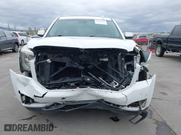 2019 GMC Yukon SLT with VIN 1GKS2BKC3KR160060, listed as a IAAI auction lot 42042122 with 124,733 mi miles. Bid and sale history available at carsss.com. Image 13.