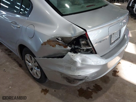 2012 Honda Civic Sdn LX with VIN 19XFB2F58CE067475, listed as a IAAI auction lot 41781509 with 126,657 mi miles. Bid and sale history available at carsss.com. Image 6.