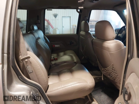 1999 Chevrolet Tahoe Z71 with VIN 1GNEK13R7XJ577796, listed as a IAAI auction lot 41036617 with 231,795 mi miles and . Bid and sale history available at DreamBid. Image 8.
