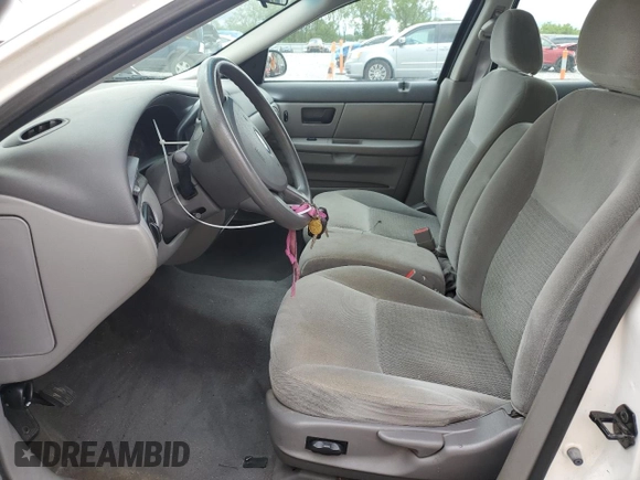 2006 Ford Taurus SE с VIN 1FAFP53U36A184540, выставлен на аукционе Copart как лот 57990175 с пробегом 144 768 миль миль и Списание • Salvage title. История ставок и продаж доступна на DreamBid. Изображение 7.