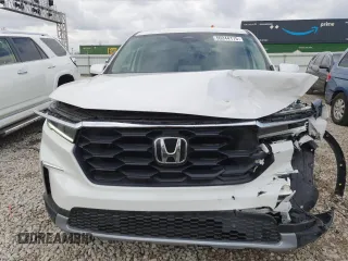 2023 Honda Pilot EX-L 7 Passenger with VIN 5FNYG1H51PB048722, listed as a Copart auction lot 50244175 with 38,662 mi miles and Salvage Title. Bid and sale history available at carsss.com. Image 5.