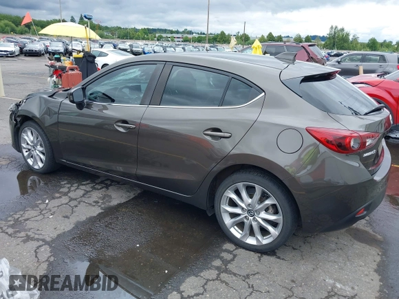 2014 Mazda 3 S Grand Touring with VIN JM1BM1M3XE1164610, listed as a IAAI auction lot 42421946 with 96,591 mi miles and . Bid and sale history available at DreamBid. Image 3.