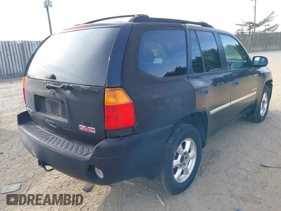 2006 GMC Envoy SLT with VIN 1GKDS13SX62260454, listed as a IAAI auction lot 41479478 with 255,019 mi miles. Bid and sale history available at carsss.com. Image 4.
