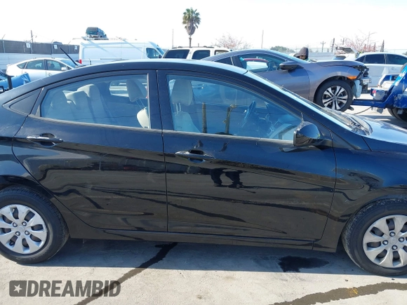 2016 Hyundai Accent SE z VIN KMHCT4AE9GU085523, wystawiony jako IAAI lot #42208002 z przebiegiem 94 653 mil mil oraz . Historia ofert i sprzedaży dostępna na DreamBid. Obrazek 13.