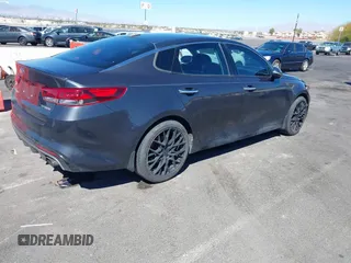 2016 Kia Optima SX Turbo with VIN 5XXGW4L29GG091635, listed as a IAAI auction lot 41884813 with 121,764 mi miles and . Bid and sale history available at carsss.com. Image 4.