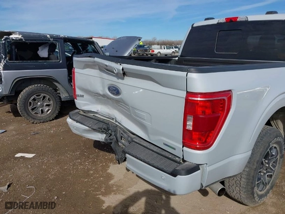 2021 Ford F-150 XL with VIN 1FTEW1EP0MKE55635, listed as a IAAI auction lot 41636980 with 44,299 mi miles. Bid and sale history available at carsss.com. Image 6.