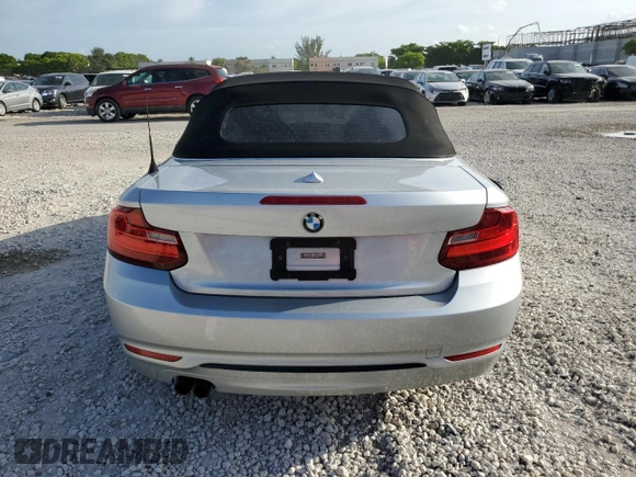 2016 BMW 2 Series 228i with VIN WBA1K9C57GV321957, listed as a Copart auction lot 59200583 with 65,761 mi miles. Bid and sale history available at carsss.com. Image 6.