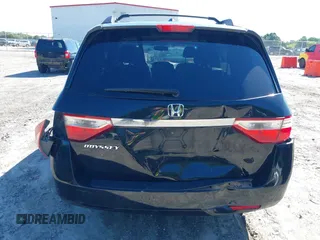 2011 Honda Odyssey EX-L with VIN 5FNRL5H67BB087064, listed as a IAAI auction lot 42326427 with 177,795 mi miles and . Bid and sale history available at DreamBid. Image 16.
