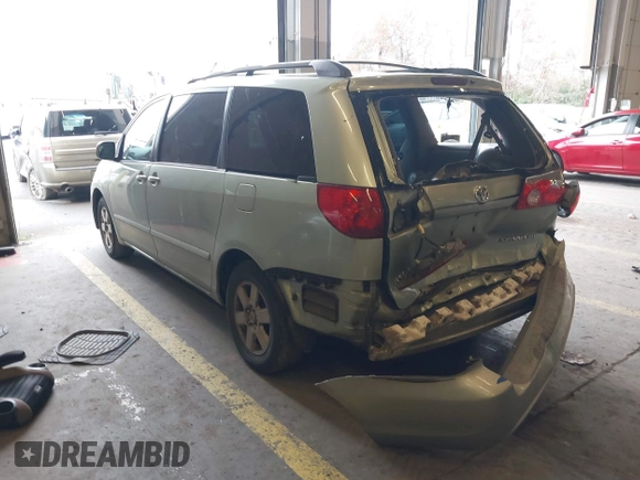 2007 Toyota Sienna XLE with VIN 5TDZK22C37S023719, listed as a IAAI auction lot 41566286 with 239,296 mi miles. Bid and sale history available at carsss.com. Image 3.