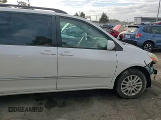 2010 Toyota Sienna XLE z VIN 5TDDK4CC8AS033402, wystawiony jako Copart lot #79083354 z przebiegiem 226 956 mil mil oraz Szkoda całkowita • Salvage title. Historia ofert i sprzedaży dostępna na DreamBid. Obrazek 11.