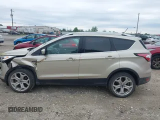 2018 Ford Escape Titanium with VIN 1FMCU9J94JUA44964, listed as a IAAI auction lot 42494471 with 100,955 mi miles and . Bid and sale history available at DreamBid. Image 14.