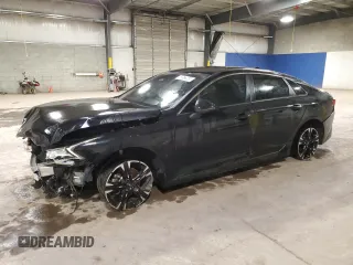 2022 Kia K5 GT-Line z VIN 5XXG64J26NG098526, wystawiony jako Copart lot #52572645 z przebiegiem 73 647 mil mil oraz Czysty tytuł • Clean title. Historia ofert i sprzedaży dostępna na DreamBid. Obrazek 1.