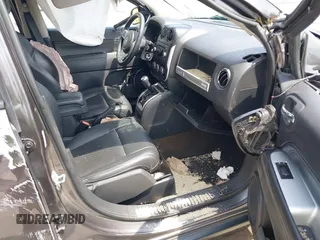 2016 Jeep Compass High Altitude Edition with VIN 1C4NJDEB0GD558230, listed as a IAAI auction lot 39799941 with 57,002 mi miles. Bid and sale history available at carsss.com. Image 5.