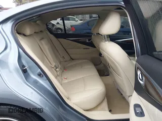 2015 Infiniti Q50 Premium with VIN JN1BV7AR4FM393974, listed as a IAAI auction lot 41874345 with 148,228 mi miles. Bid and sale history available at carsss.com. Image 8.