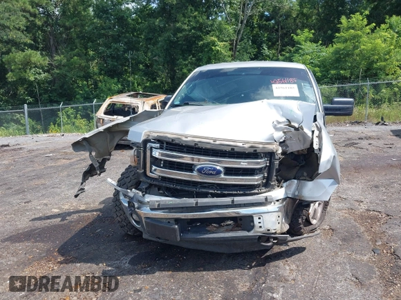 2014 Ford F-150 XL with VIN 1FTFW1EF9EKD53666, listed as a IAAI auction lot 42561185 with 239,511 mi miles and . Bid and sale history available at DreamBid. Image 6.