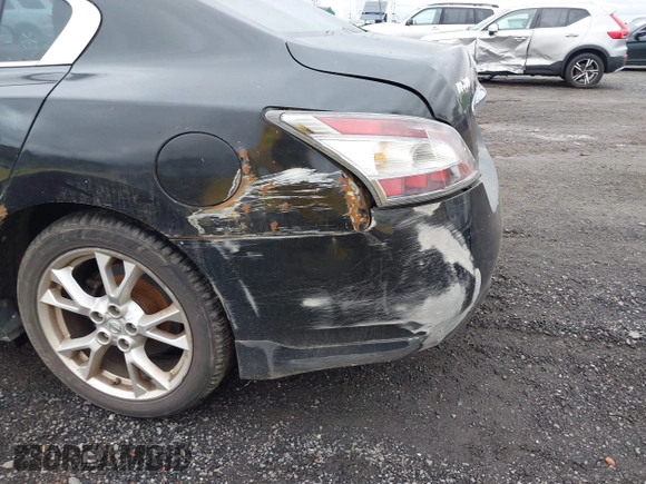 2014 Nissan Maxima SV with VIN 1N4AA5AP7EC490068, listed as a IAAI auction lot 42332173 with 126,323 mi miles and . Bid and sale history available at DreamBid. Image 6.
