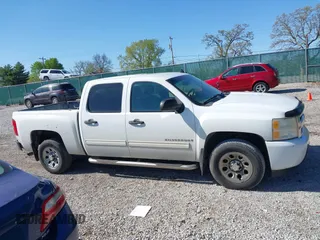 2009 Chevrolet Silverado 1500 LS with VIN 3GCEC13CX9G256034, listed as a IAAI auction lot 42049573 with 223,057 mi miles. Bid and sale history available at carsss.com. Image 13.