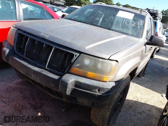 1999 Jeep Grand Cherokee Laredo with VIN 1J4GW58S0XC678864, listed as a IAAI auction lot 37593033 with Not provided miles and . Bid and sale history available at DreamBid. Image 2.