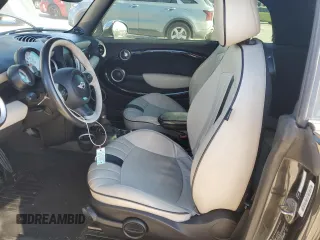 2014 MINI Convertible S with VIN WMWZP3C58ET706941, listed as a Copart auction lot 81900674 with 61,292 mi miles and Salvage title. Bid and sale history available at DreamBid. Image 7.