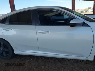 2020 Honda Civic LX with VIN 19XFC2F66LE007328, listed as a IAAI auction lot 41852111 with 135,956 mi miles and . Bid and sale history available at DreamBid. Image 13.