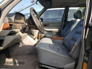 1990 Mercedes-Benz 560 with VIN WDBCA39E8LA508059, listed as a Copart auction lot 75865254 with 222,616 mi miles and Clean Title. Bid and sale history available at DreamBid. Image 7.
