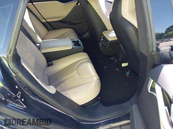 2015 Tesla Model S 85D with VIN 5YJSA4H47FF083005, listed as a IAAI auction lot 40970624 with 84,327 mi miles. Bid and sale history available at carsss.com. Image 8.
