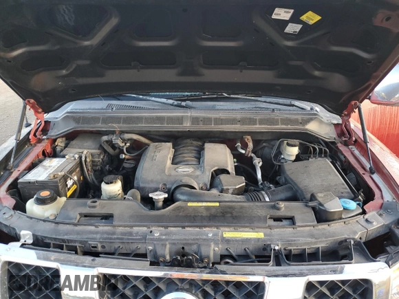 2006 Nissan Titan LE z VIN 1N6BA07B86N546972, wystawiony jako Copart lot #74983924 z przebiegiem 225 495 mil mil oraz Szkoda całkowita • Salvage title. Historia ofert i sprzedaży dostępna na DreamBid. Obrazek 12.