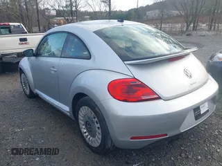 2016 Volkswagen Beetle SE с VIN 3VWJ17AT3GM606917, выставлен на аукционе IAAI как лот 41728053 с пробегом Не указан миль и . История ставок и продаж доступна на DreamBid. Изображение 14.