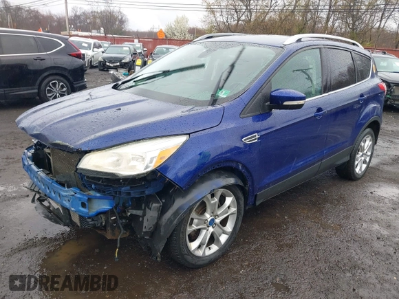 2014 Ford Escape Titanium with VIN 1FMCU9J99EUA46103, listed as a IAAI auction lot 42018097 with 169,878 mi miles and . Bid and sale history available at DreamBid. Image 19.