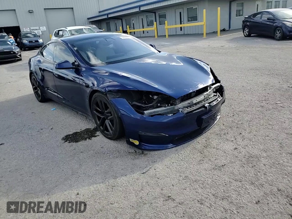 2021 Tesla Model S Long Range z VIN 5YJSA1E52MF437103, wystawiony jako Copart lot #55533515 z przebiegiem 59 015 mil mil oraz Szkoda całkowita • Salvage title. Historia ofert i sprzedaży dostępna na DreamBid. Obrazek 14.