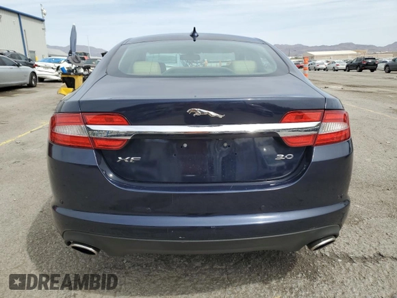 2014 Jaguar XF SC with VIN SAJWA0EX3E8U17748, listed as a Copart auction lot 52010435 with 84,685 mi miles and Salvage Title. Bid and sale history available at DreamBid. Image 6.