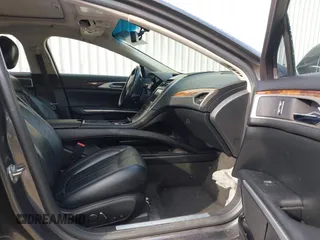 2016 Lincoln MKZ with VIN 3LN6L2G99GR609353, listed as a IAAI auction lot 42106982 with 161,046 mi miles and . Bid and sale history available at DreamBid. Image 5.
